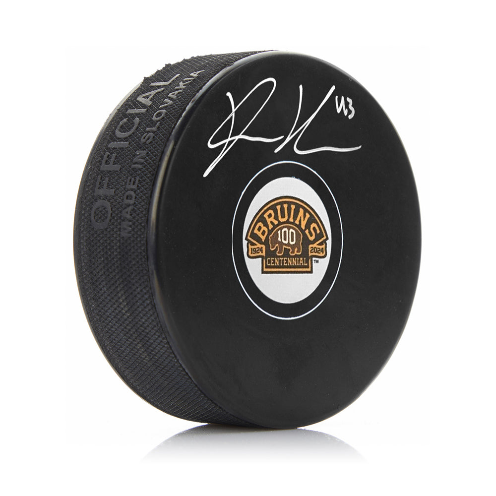 Danton Heinen Autographed Boston Bruins 100th Anniversary Hockey Logo Puck