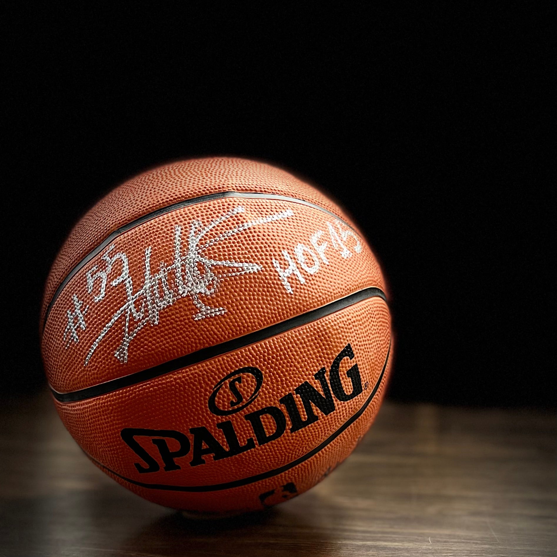 Dikembe Mutombo Autographed Spalding Basketball with Hall of Fame Inscription - Dynasty Sports & Framing
