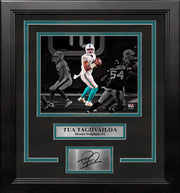 Tua Tagovailoa in Action Miami Dolphins 8x10 Framed Blackout Football Photo with Engraved Autograph - Dynasty Sports & Framing