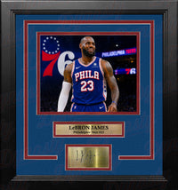 Framed photo of Philadelphia 76ers superstar LeBron James with engraved nameplate, laser-engraved replica autograph, and 76ers themed matting and trim