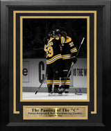 Brad Marchand & Patrice Bergeron Hug During Bergeron's Final Game Boston Bruins 11x14 Framed Photo - Dynasty Sports & Framing 