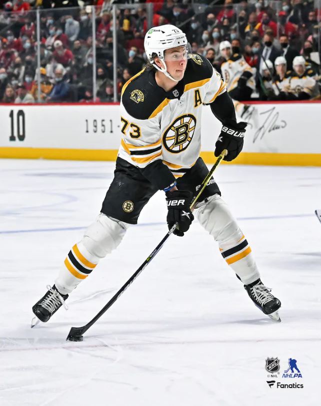 Charlie McAvoy in Action Boston Bruins 8" x 10" Vertical Hockey Photo