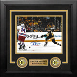 An autographed 8x10 framed sports photo print of Boston Bruins star Fraser Minten making a slapshot, with a player's signature in blue ink at the bottom.