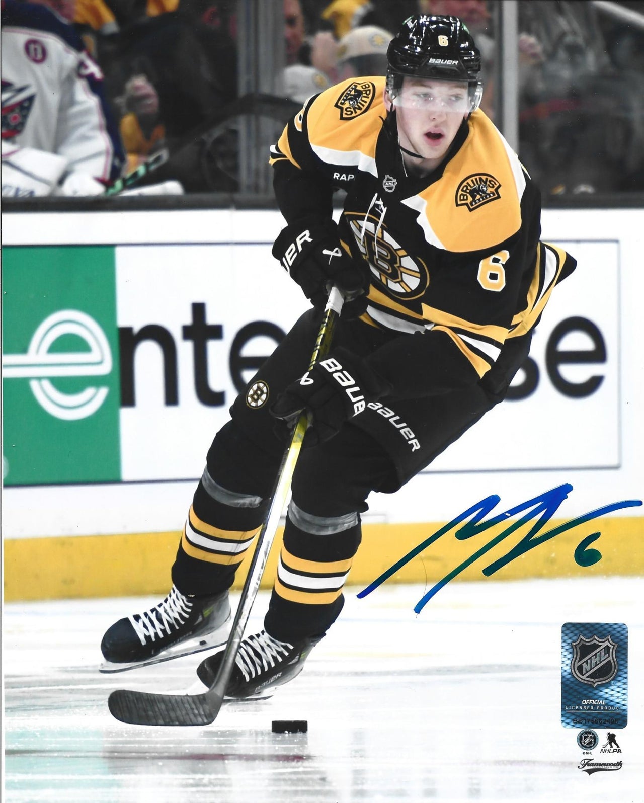 Mason Lohrei in Action Boston Bruins Autographed 8" x 10" Hockey Photo