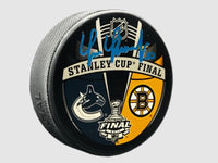 Tim Thomas Boston Bruins Autographed 2011 Stanley Cup Finals Puck - Dynasty Sports & Framing 