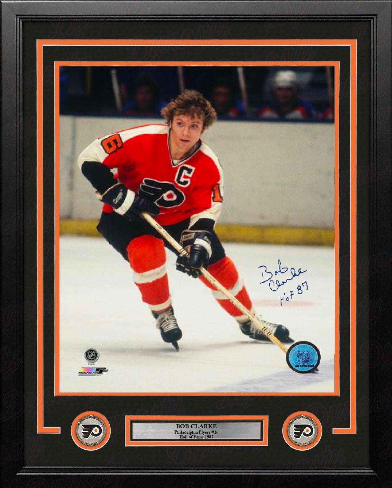 Bob Clarke Skating Action Philadelphia Flyers Autographed 16" x 20" Framed Hockey Photo - Hall Fame