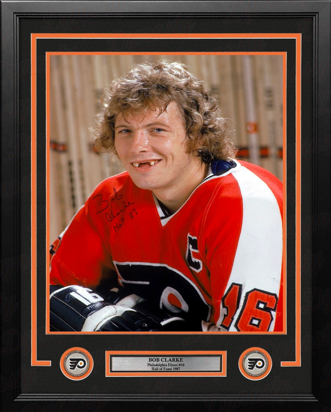 Bob Clarke Toothless Smile Philadelphia Flyers Autographed 16" x 20" Framed Hockey Photo - HOF