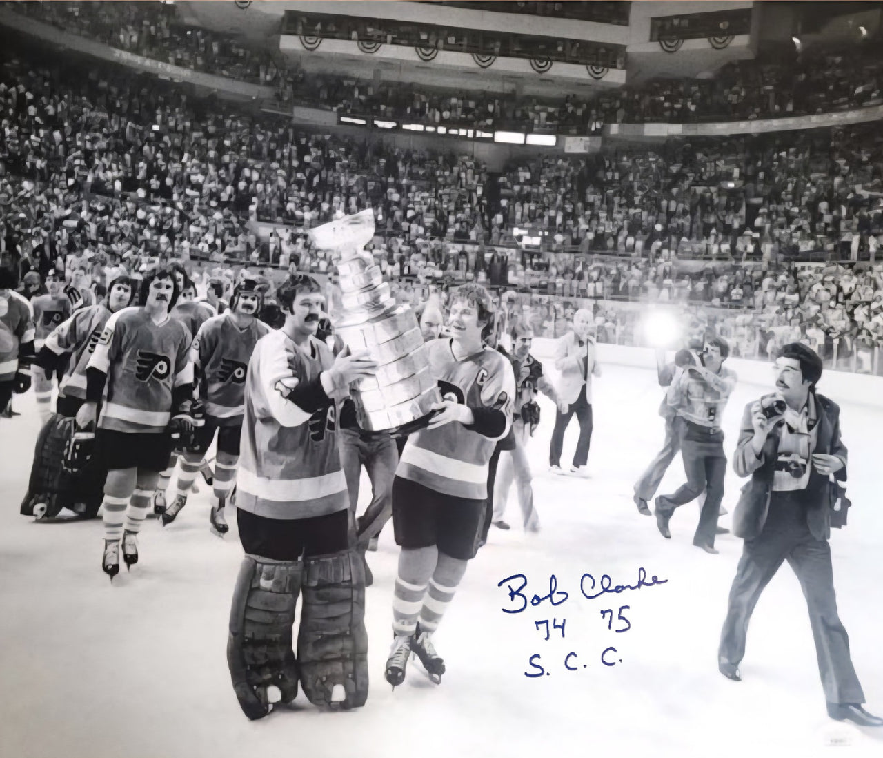 Bob Clarke Stanley Cup Celebration Philadelphia Flyers Autographed 16" x 20" Hockey Photo: SC Champs