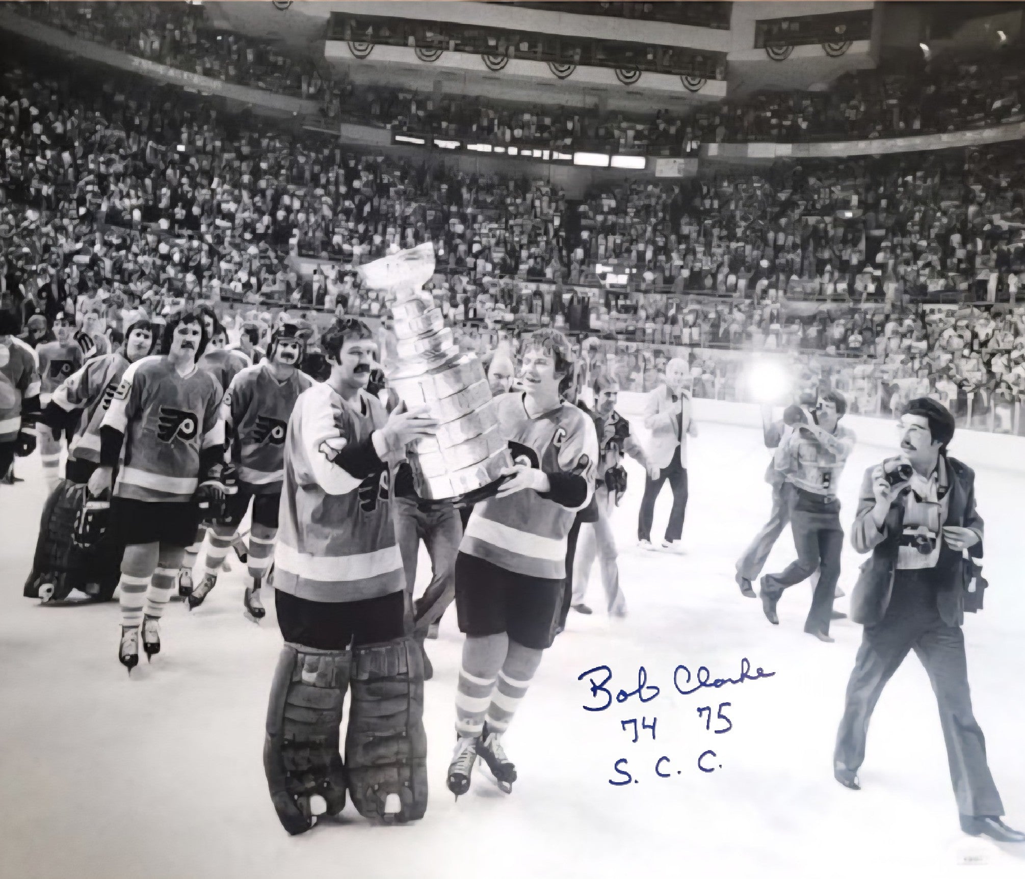 Bob Clarke Stanley Cup Celebration Philadelphia Flyers Autographed 16" x 20" Hockey Photo: SC Champs