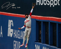 Autographed 16x20 photo from Philadelphia Phillies star Derek Hill, robbing Juan Soto of a home run with 'Sorry Soto' inscription.