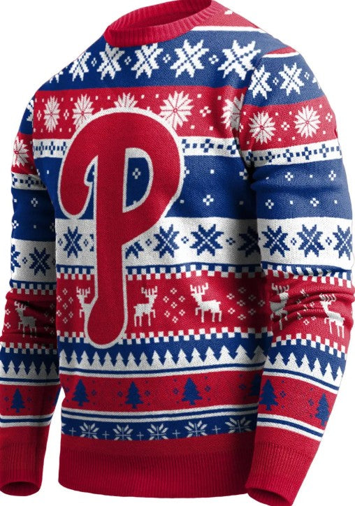 A Philadelphia Phillies themed Christmas sweater featuring a large red 'P' logo on the front, surrounded by festive red, white, and blue holiday patterns including snowflakes, snow dogs, and Christmas trees.