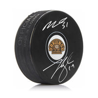 Matthew Poitras & Johnny Beecher Autographed Boston Bruins 100th Anniversary Hockey Logo Puck - Dynasty Sports & Framing 