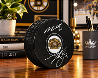 Matthew Poitras & Johnny Beecher Autographed Boston Bruins 100th Anniversary Hockey Logo Puck