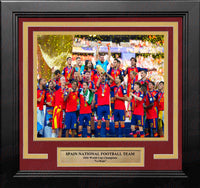 Framed Spain national football team 2022 World Cup Champions photo print with a black frame, red mat, gold inner mat, and a gold plaque at the bottom reading 'SPAIN NATIONAL FOOTBALL TEAM 2022 World Cup Champions "La Roja".