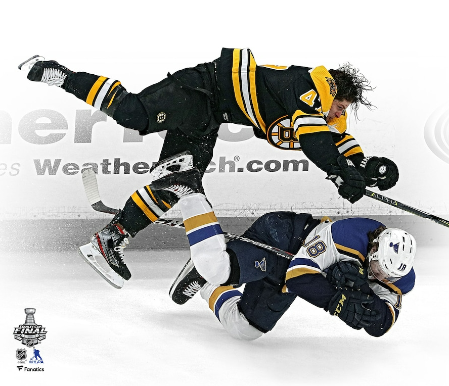 Torey Krug Boston Bruins 2019 Stanley Cup Finals Game 1 Hit 8" x 10" Hockey Photo - Dynasty Sports & Framing