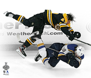 Torey Krug Boston Bruins 2019 Stanley Cup Finals Game 1 Hit 8" x 10" Hockey Photo - Dynasty Sports & Framing 