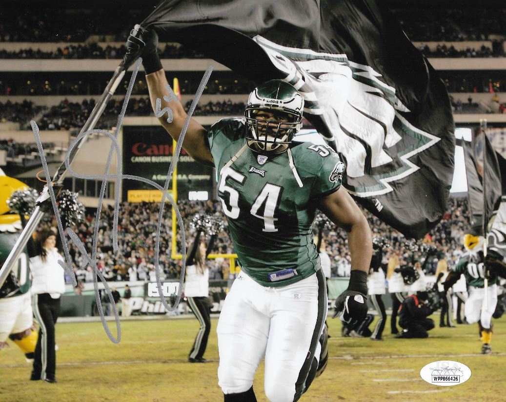 Jeremiah Trotter Carrying the Flag Philadelphia Eagles Autographed Football Photo - Dynasty Sports & Framing 
