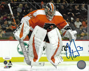 Carter Hart Philadelphia Flyers Jump Autographed NHL Hockey Photo - Dynasty Sports & Framing 