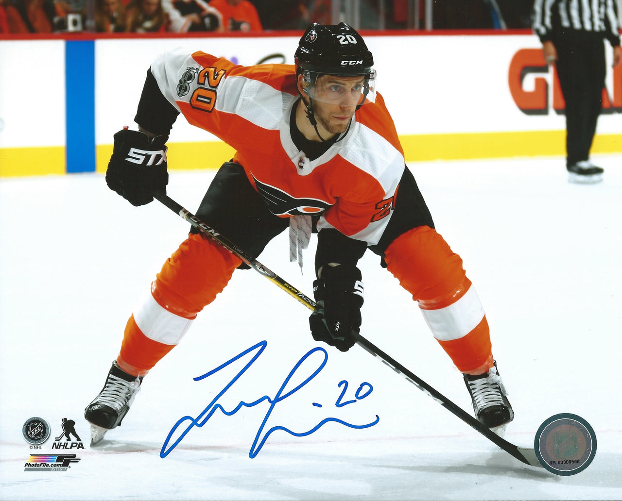 Taylor Leier Faceoff Philadelphia Flyers Autographed Hockey Photo - Dynasty Sports & Framing 