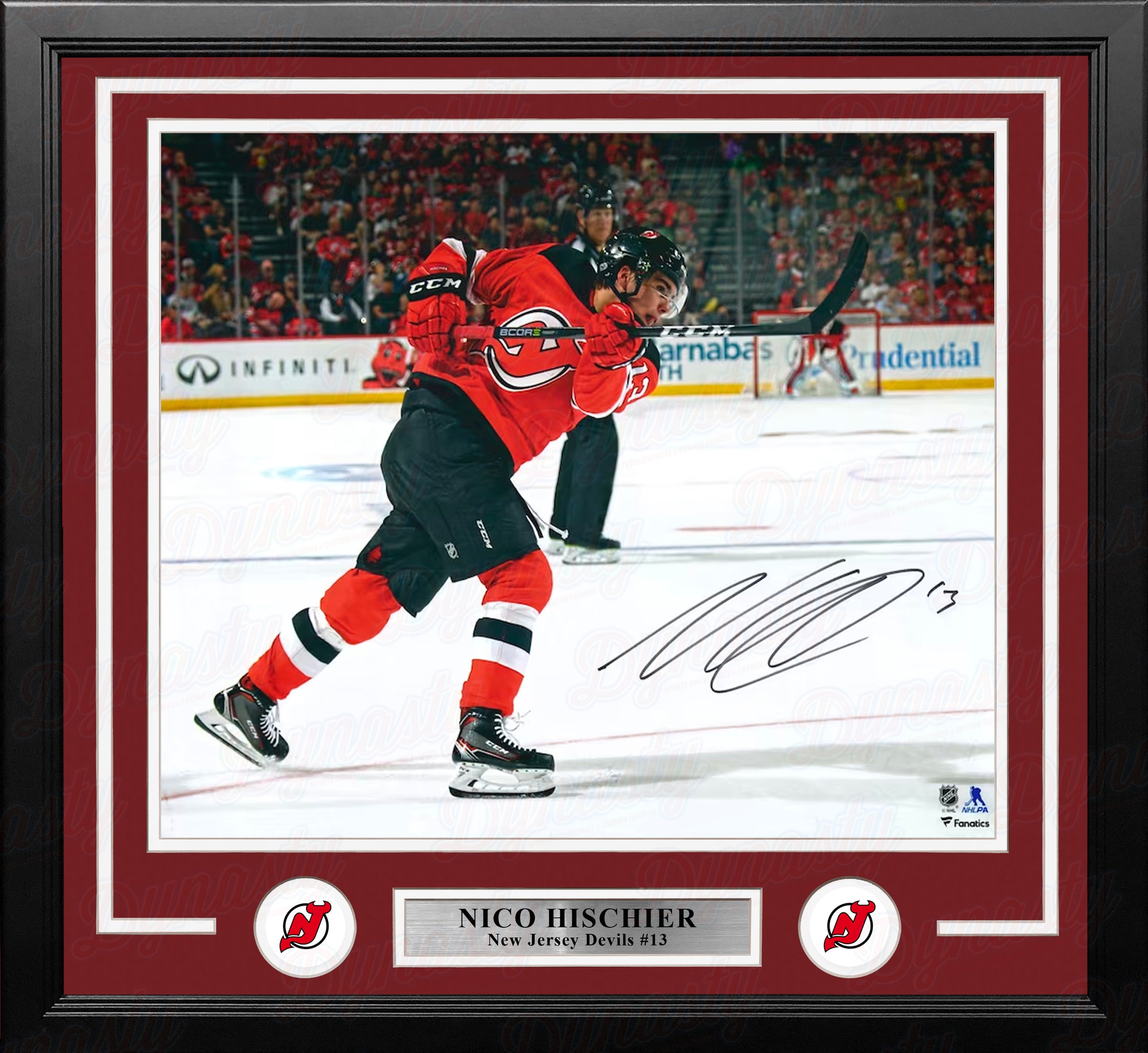 Nico Hischier Shooting Action New Jersey Devils Autographed 16" x 20" Framed Hockey Photo - Dynasty Sports & Framing 