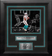 Tua Tagovailoa in Action Miami Dolphins 8x10 Framed Blackout Football Photo with Engraved Autograph - Dynasty Sports & Framing 