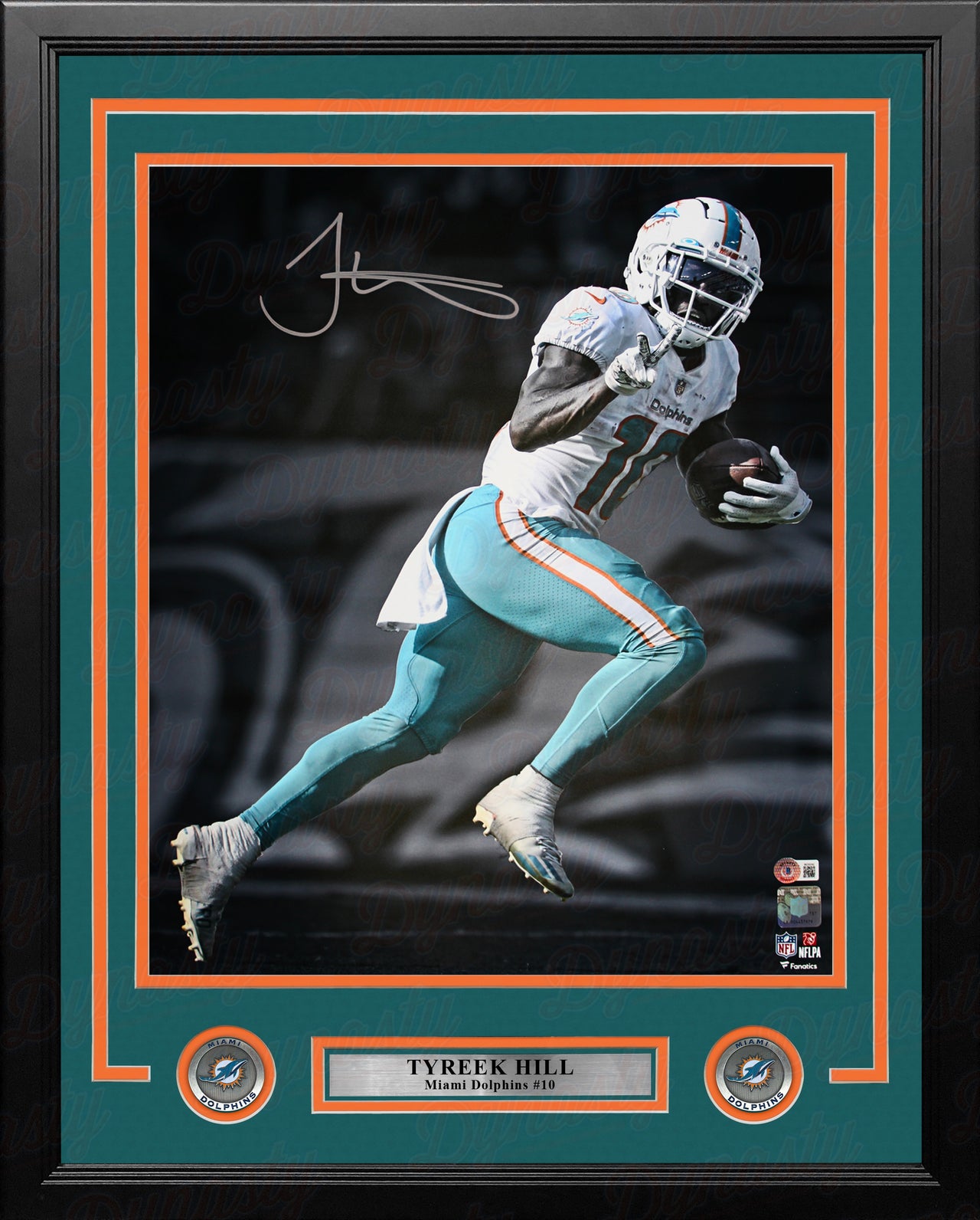 Tyreek Hill in Action Miami Dolphins Autographed Framed Football Photo - Dynasty Sports & Framing 